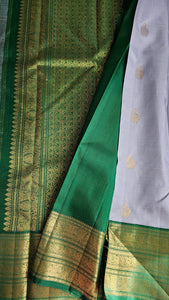 Silver Blue Korvai with forest green border & blouse