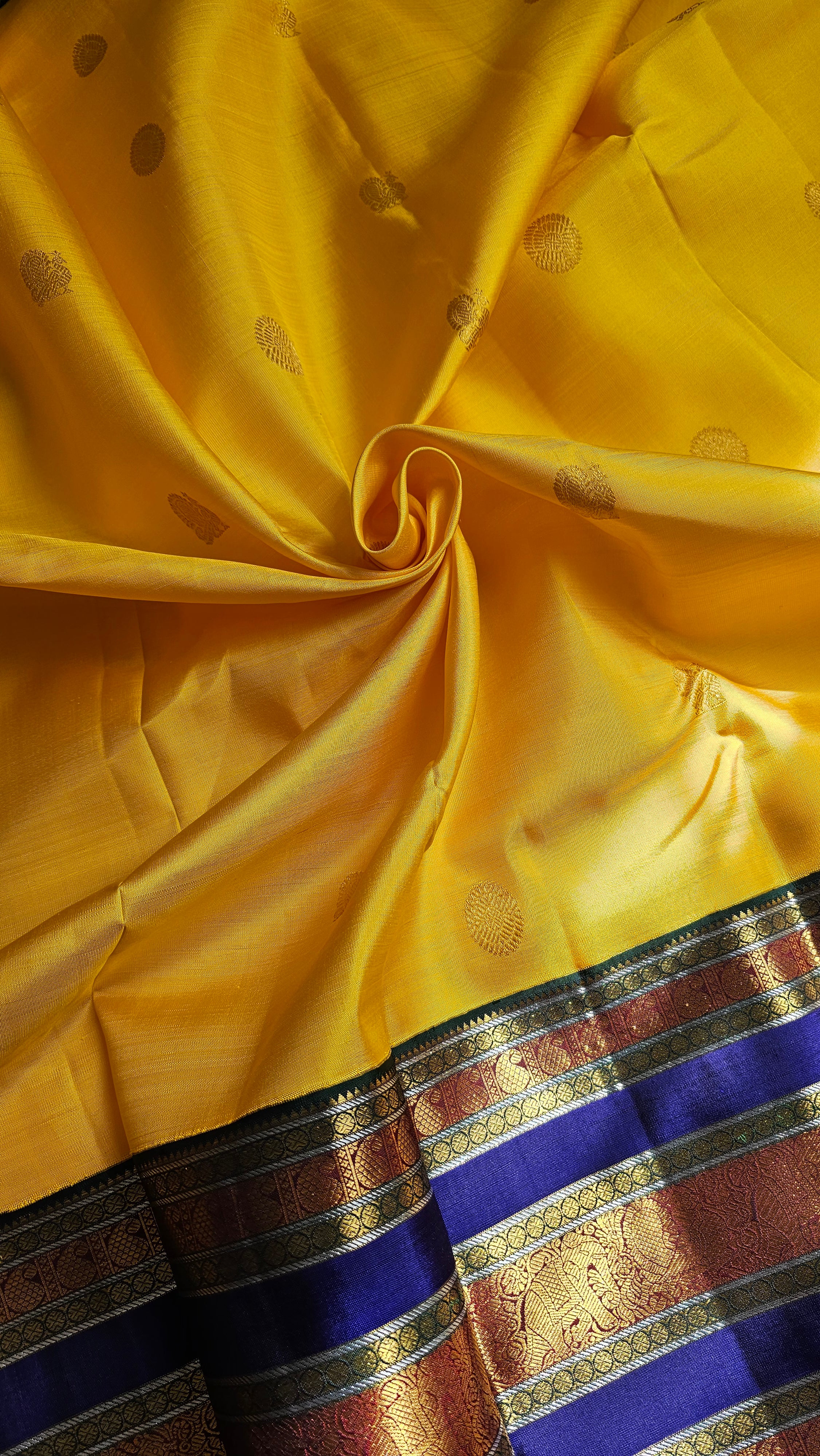 Yellow Korvai Kanchipuram with Navy border and blouse