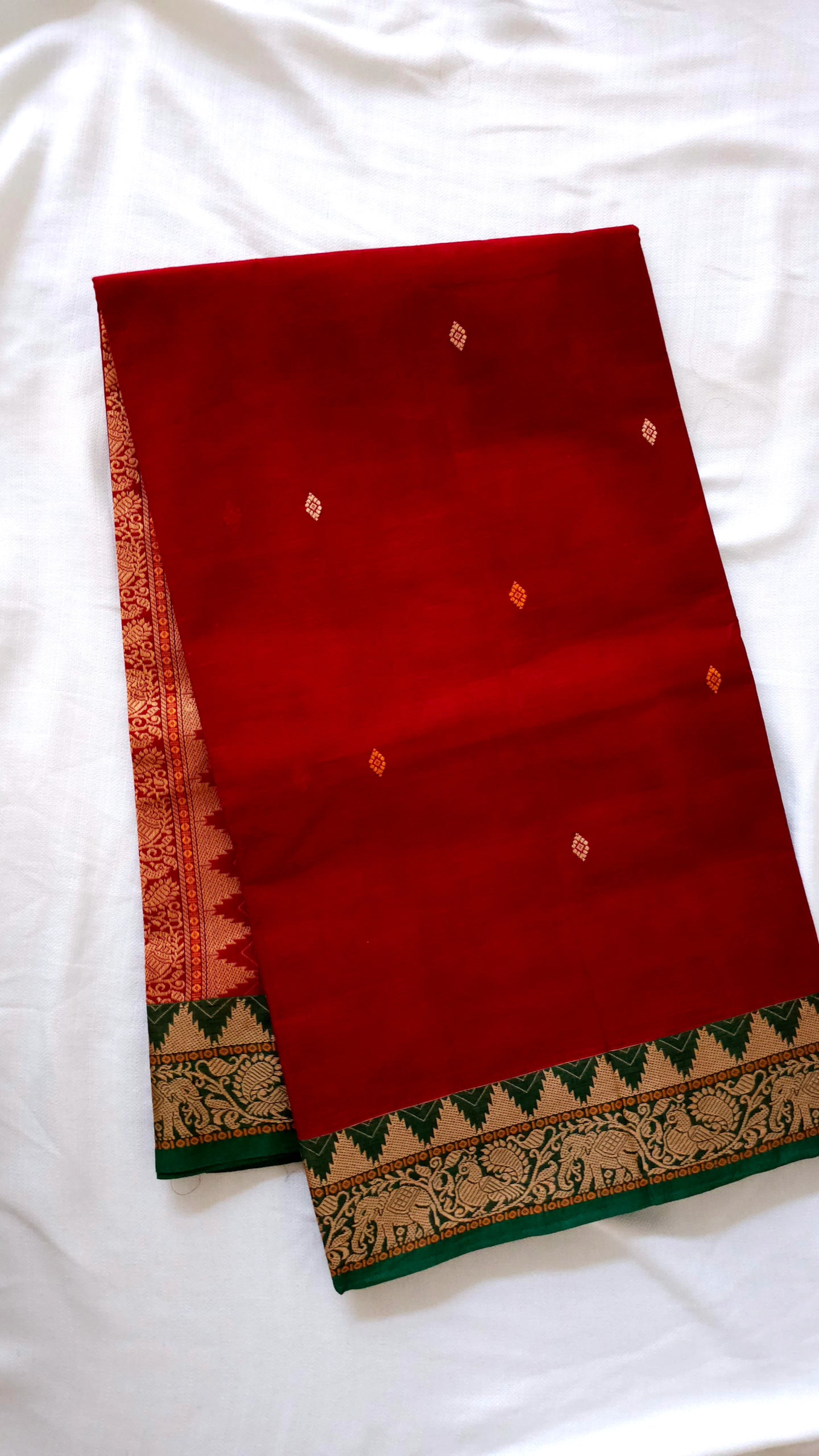 Dark red with green border Kanchi Cotton