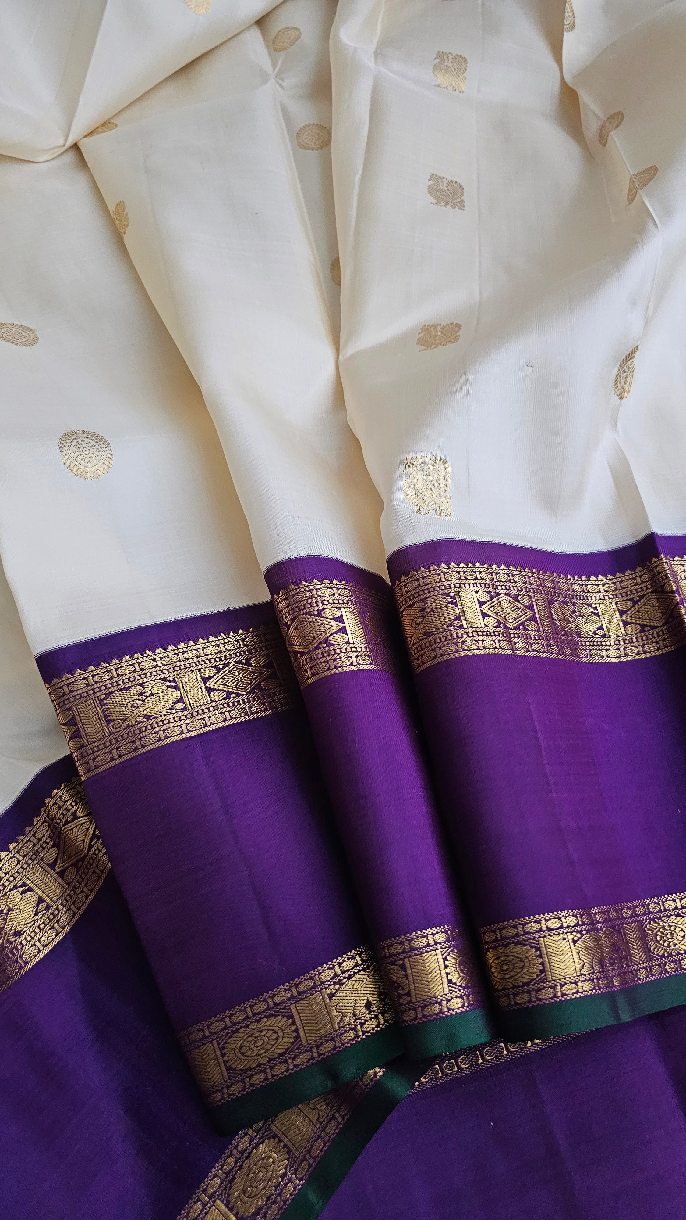 Cream Korvai Kanchipuram with a deep violet border