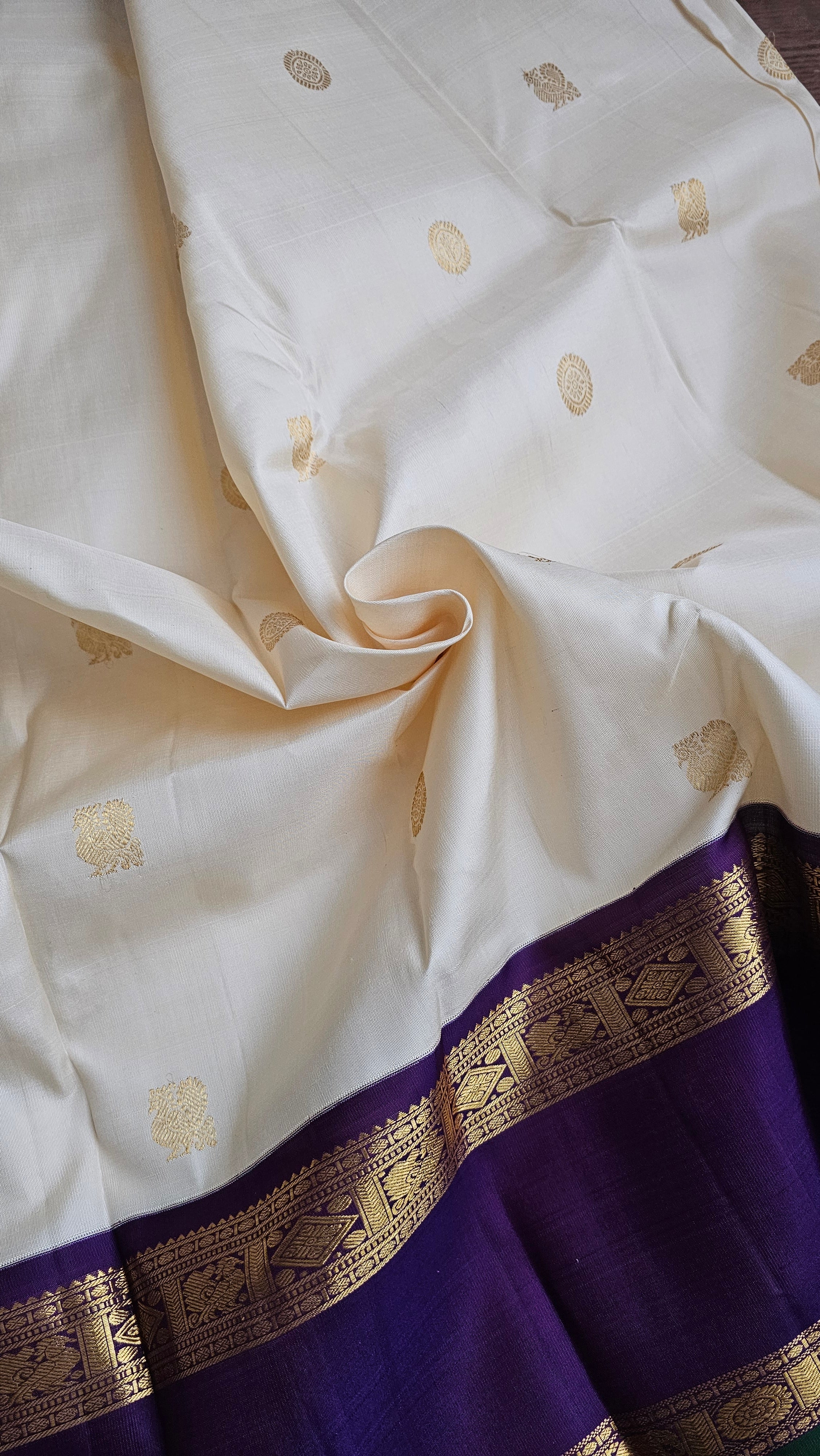 Cream Korvai Kanchipuram with a deep violet border